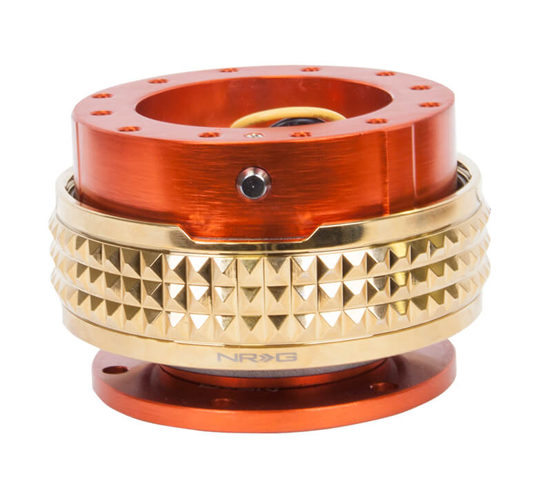 NRG Quick Release Kit Orange Body with Chrome Gold Pyramid Ring - 2.1 Pyramid Series SRK-210OR-CG, featuring a vibrant orange design with a unique chrome gold pyramid pattern, high-quality build, and ergonomic installation for Japanese mini trucks