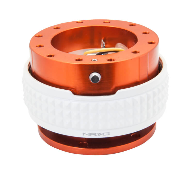 NRG Quick Release Kit Orange Body with Glow in the Dark Pyramid Ring - 2.1 Pyramid Series SRK-210OR-GL, featuring a vibrant orange design with a unique glow in the dark pyramid pattern for enhanced style and night visibility.