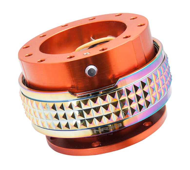 Close-up of the NRG Quick Release Kit with Orange Body and Neochrome Pyramid Ring - 2.1 Pyramid Series - SRK-210OR-MC, highlighting the detailed pyramid pattern and sleek orange finish, perfect for Japanese mini truck enthusiasts.