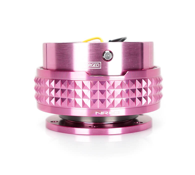 NRG Quick Release Kit with Pink Body and Pink Pyramid Ring - 2.1 Pyramid Series - SRK-210PK, showcasing a sleek pink finish with an intricately designed pyramid-patterned ring.