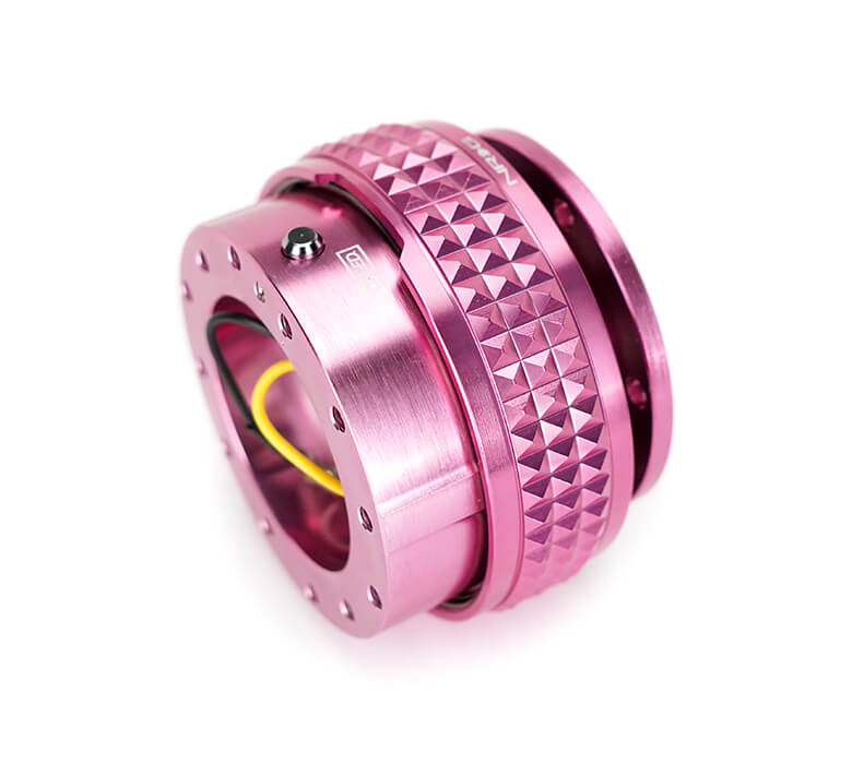 Close-up of the NRG Quick Release Kit - Pink Body / Pink Pyramid Ring - 2.1 Pyramid Series - SRK-210PK, highlighting the vibrant pink color and detailed pyramid pattern.