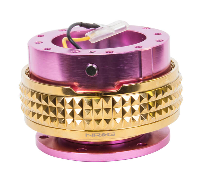 NRG Quick Release Kit with Pink Body and Chrome Gold Pyramid Ring - 2.1 Pyramid Series - SRK-210PK-CG, showcasing a sleek pink finish with an elegant chrome gold pyramid-patterned ring.