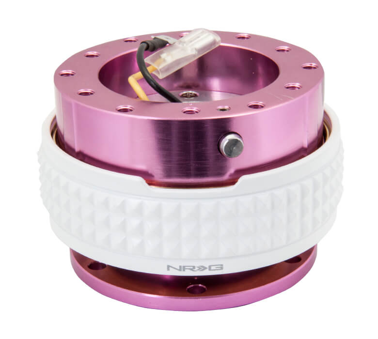 NRG Quick Release Kit with Pink Body and Glow in the Dark Pyramid Ring - 2.1 Pyramid Series - SRK-210PK-GL, showcasing a sleek pink finish with a unique glow in the dark pyramid-patterned ring.