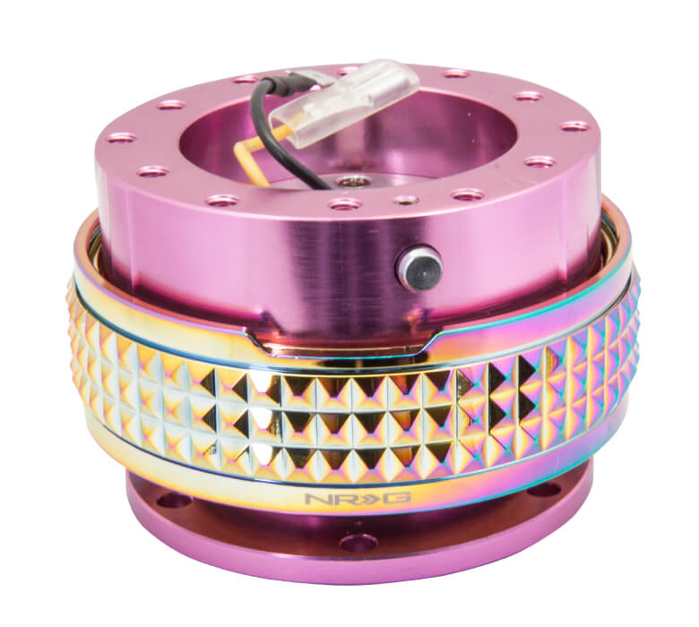 NRG Quick Release Kit with Pink Body and Neochrome Pyramid Ring - 2.1 Pyramid Series - SRK-210PK-MC, showcasing a sleek pink finish with an eye-catching neochrome pyramid-patterned ring.