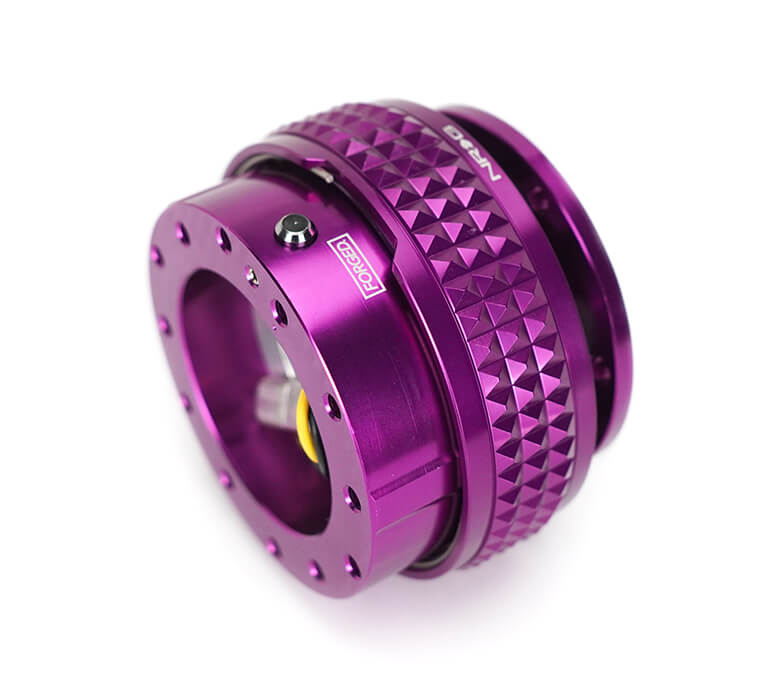 Close-up of the NRG Quick Release Kit - Purple Body / Purple Pyramid Ring - 2.1 Pyramid Series - SRK-210PP-PP, highlighting the vibrant purple color and detailed pyramid pattern.