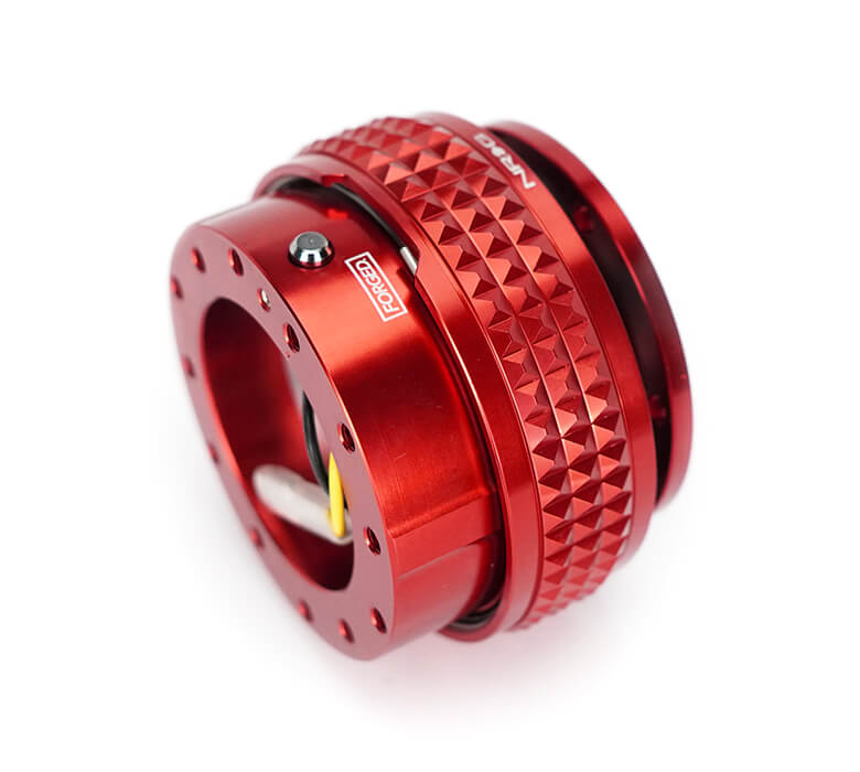 Close-up of the NRG Quick Release Kit - Red Body / Red Pyramid Ring - 2.1 Pyramid Series - SRK-210RD-RD, highlighting the vibrant red color and detailed pyramid pattern.