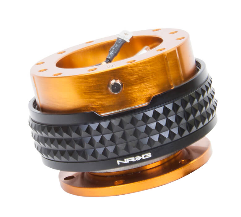 Close-up of the NRG Quick Release Kit - Rose Gold Body / Black Pyramid Ring - 2.1 Pyramid Series - SRK-210RG-BK, highlighting the vibrant rose gold color and detailed black pyramid pattern.