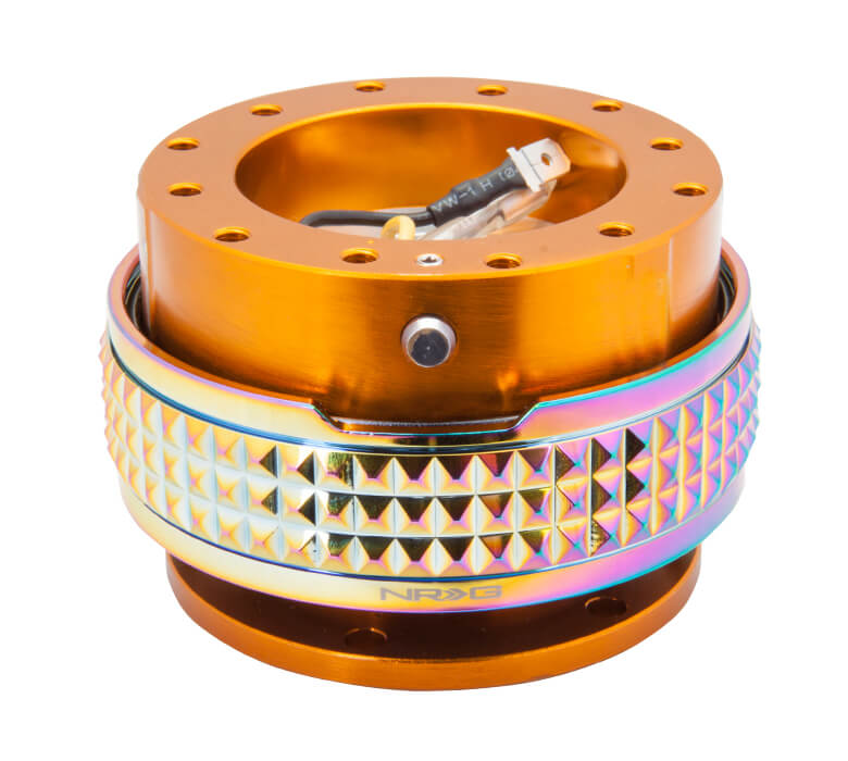 Close-up of the NRG Quick Release Kit - Rose Gold Body / Neochrome Pyramid Ring - 2.1 Pyramid Series - SRK-210RG/MC, highlighting the vibrant rose gold color and detailed neochrome pyramid pattern.