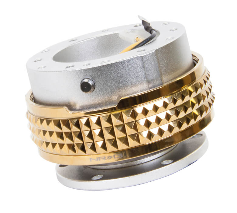 Close-up of the NRG Quick Release Kit - Silver Body / Chrome Gold Pyramid Ring - 2.1 Pyramid Series - SRK-210SL-CG, highlighting the vibrant silver color and detailed chrome gold pyramid pattern.