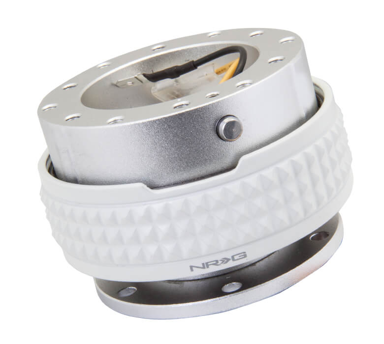 Close-up of the NRG Quick Release Kit - Silver Body / Glow in the Dark Pyramid Ring - 2.1 Pyramid Series - SRK-210SL/GL, highlighting the vibrant silver color and detailed glow in the dark pyramid pattern.