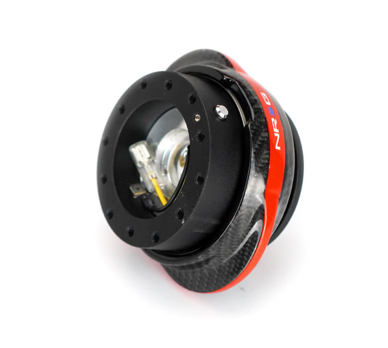 Close-up of the NRG Quick Release Kit - Black Body / Carbon Fiber Red Ring - Gen 2.2 - SRK-220BK-CF/RD, highlighting the vibrant black color and detailed carbon fiber red ring design.