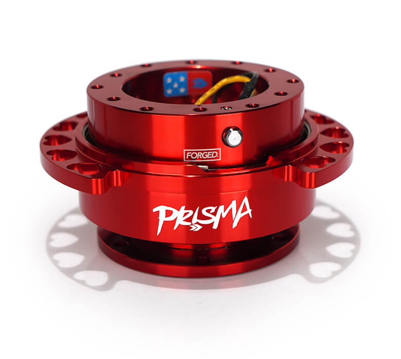 Front view of NRG Quick Release Kit SRK-222RD-RD with red body, heart cutout ring, and Prisma logo.