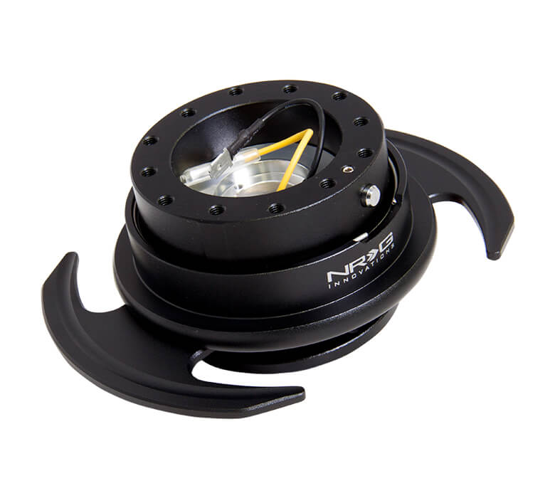 NRG Quick Release Kit SRK-650BK with black body, black ring with handles, and NRG Innovations logo, featuring ergonomic design for easy operation.