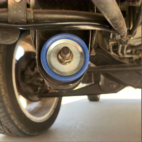 (installed on vehicle): Honda Acty HH3 HH4 1990-1999 suspension bushing installed, blue polyurethane bushing upgrade shown at control arm mount with washer and nut from 10 piece kit