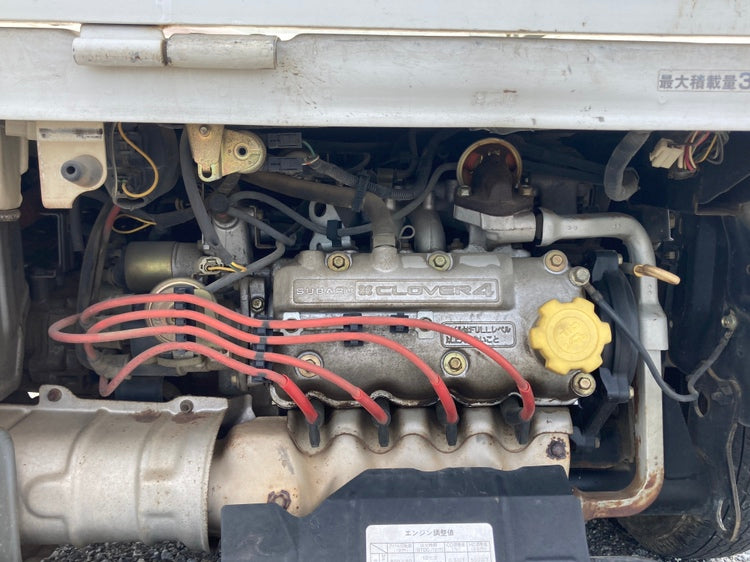 Subaru Sambar Truck Engine Parts close-up featuring Clover4 engine, spark plug wires, and components ideal for KS3, KS4 models (1990-1998) maintenance and repair.