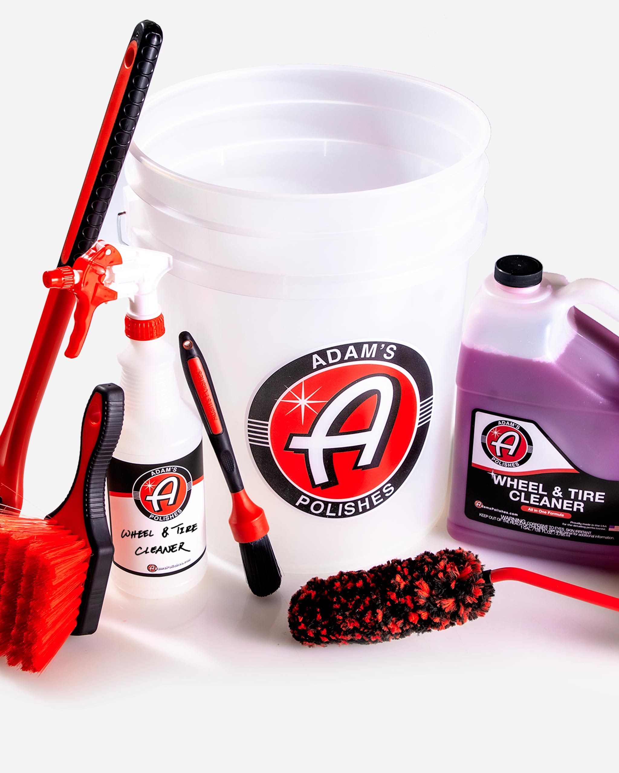 Adam’s Polishes 5-gallon detailing bucket, Wheel & Tire Cleaner, and premium brushes from the Best Wheel Cleaner Complete Kit, designed to remove brake dust on stock wheels.