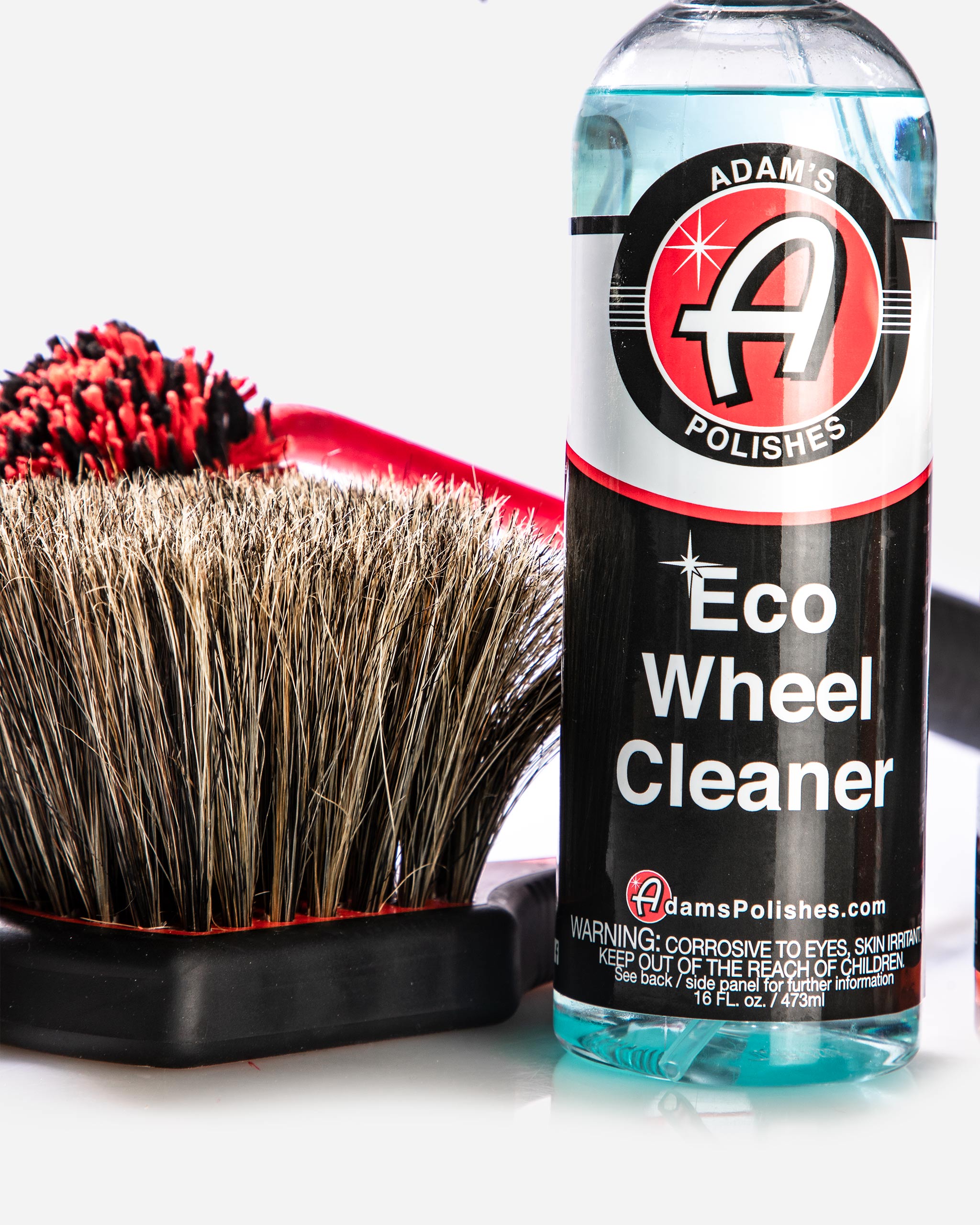 Eco Wheel Cleaner from Adam’s Polishes Best Wheel Cleaner Basic Kit, shown with a boar’s hair brush to protect sensitive finishes on aftermarket wheels.