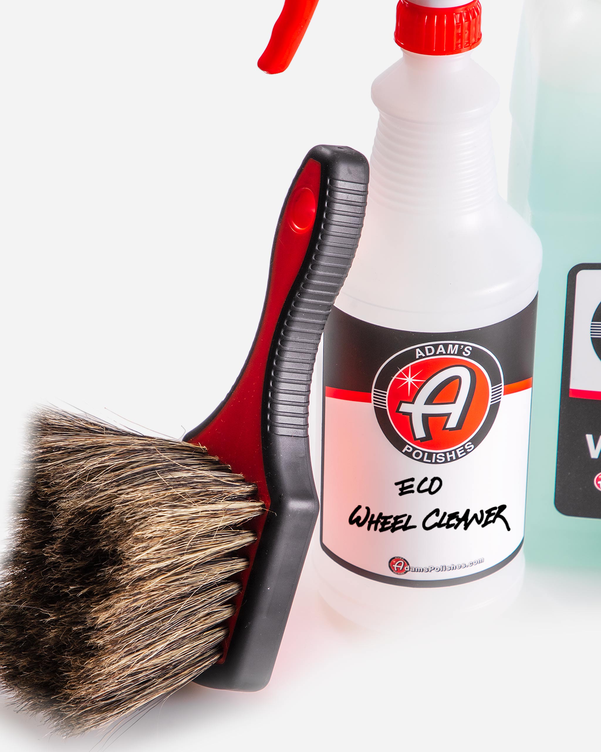 Detailed view of the boar’s hair brush and Eco Wheel Cleaner from Adam’s Polishes Best Wheel Cleaner kit, perfect for safely removing grime from aftermarket or delicate wheel finishes.