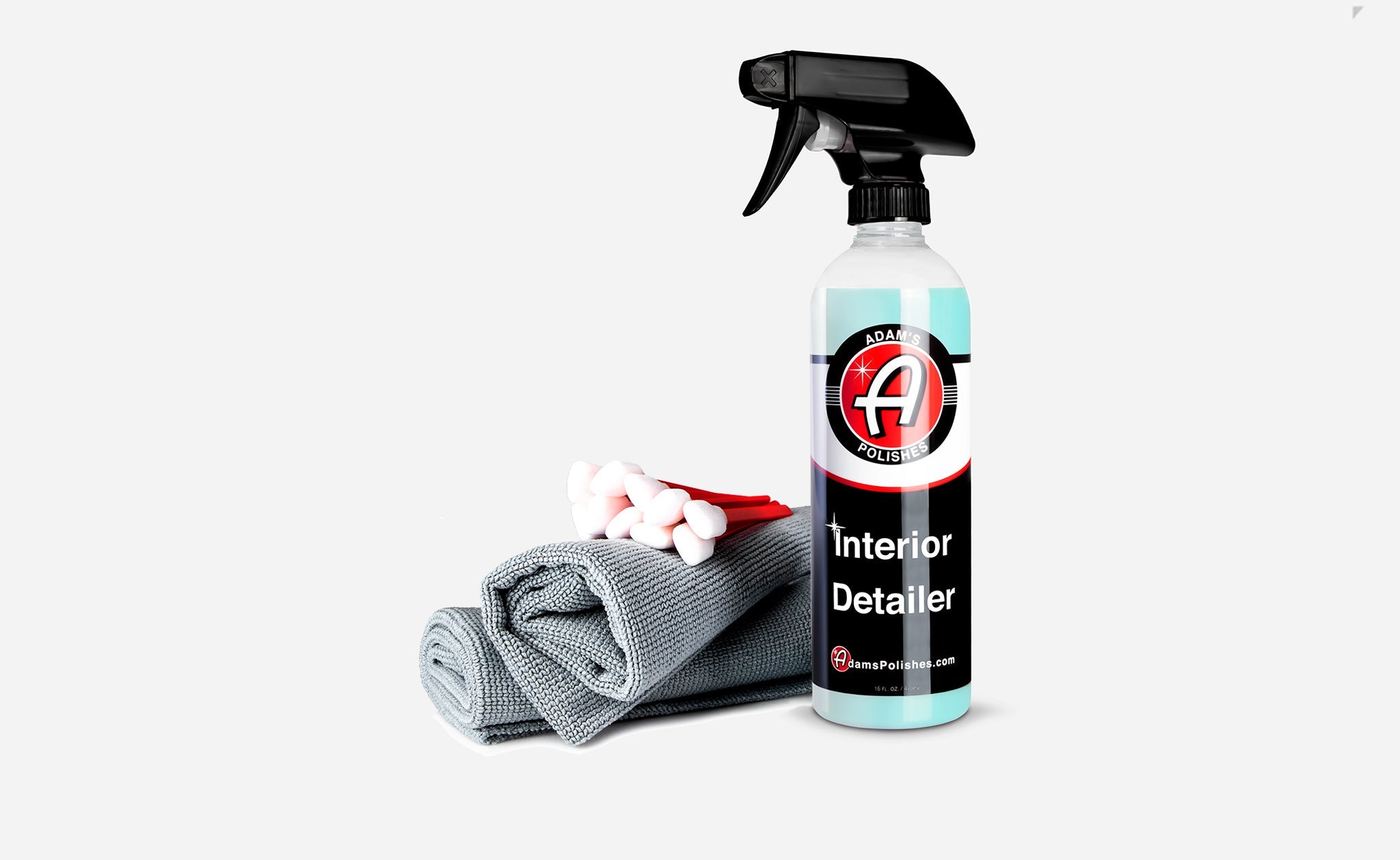 Best Car Interior Cleaner from Adam’s Polishes Basic Kit, featuring a matte, UV & odor protection formula, gray microfiber towel, and detailing swabs.