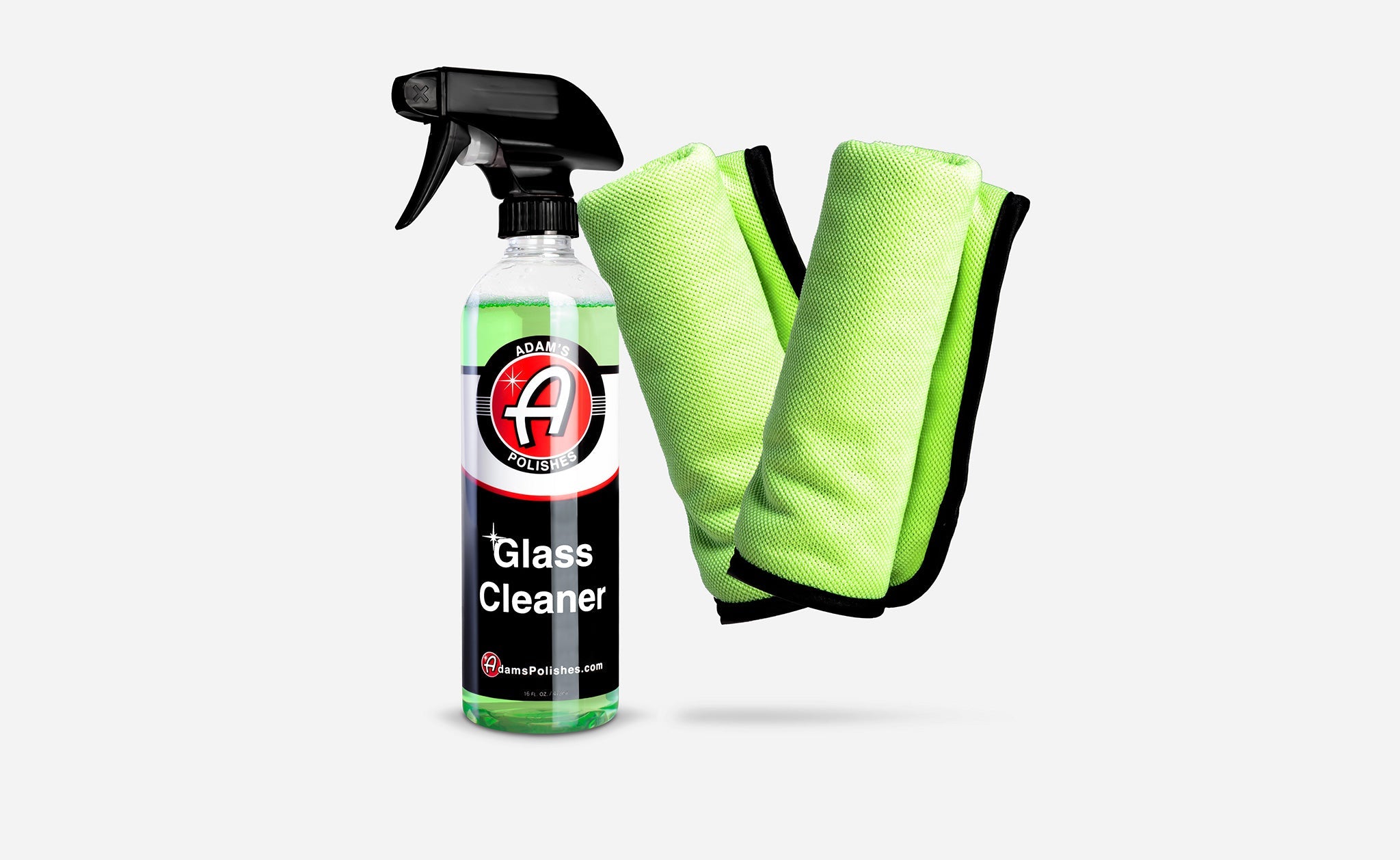 Best Car Window Cleaner combo by Adam’s Polishes featuring a green glass cleaner spray bottle and matching microfiber towels for a streak-free shine.