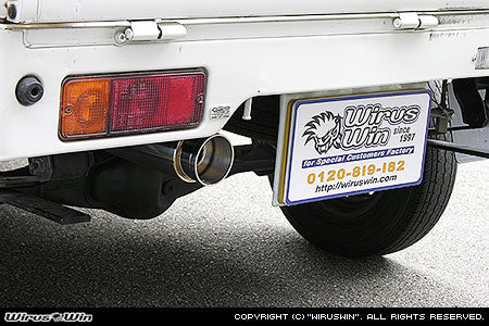 Wirus Win Compact Bazooka Muffler for Suzuki Carry Truck models GD-DA52T, GD-DB52T, LE-DA62T, LE-DA63T (1999-2005), featuring a sleek silver exhaust design.
