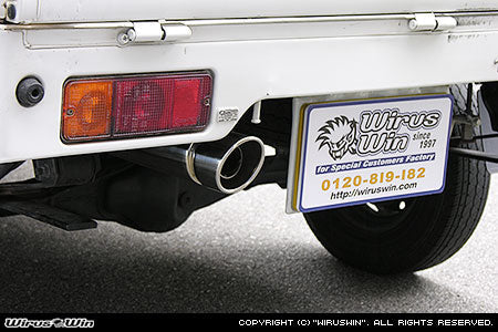Wirus Win Compact Popper Muffler for Suzuki Carry Truck models GD-DA52T, GD-DB52T, LE-DA62T, LE-DA63T (1999-2005) featuring a sleek silver exhaust design.