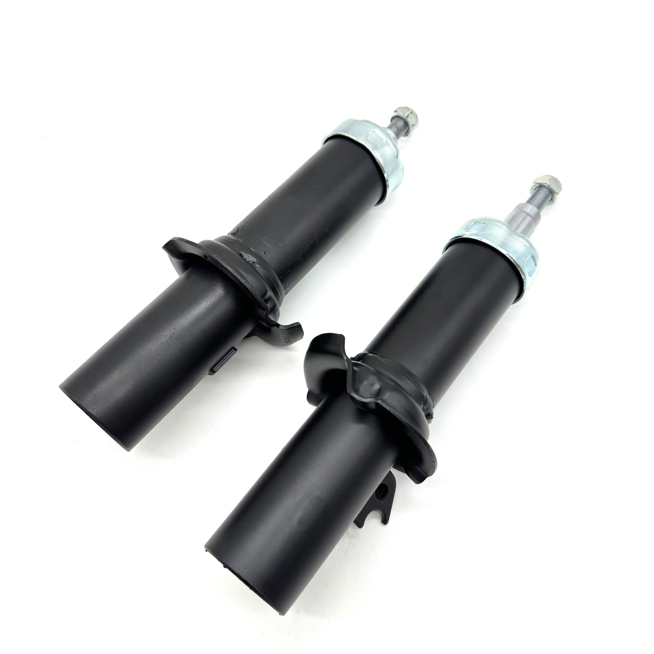 Detailed view of top and bottom of Honda Acty front struts, highlighting the precision engineering for HA6, HA7 models from 1999-2009.