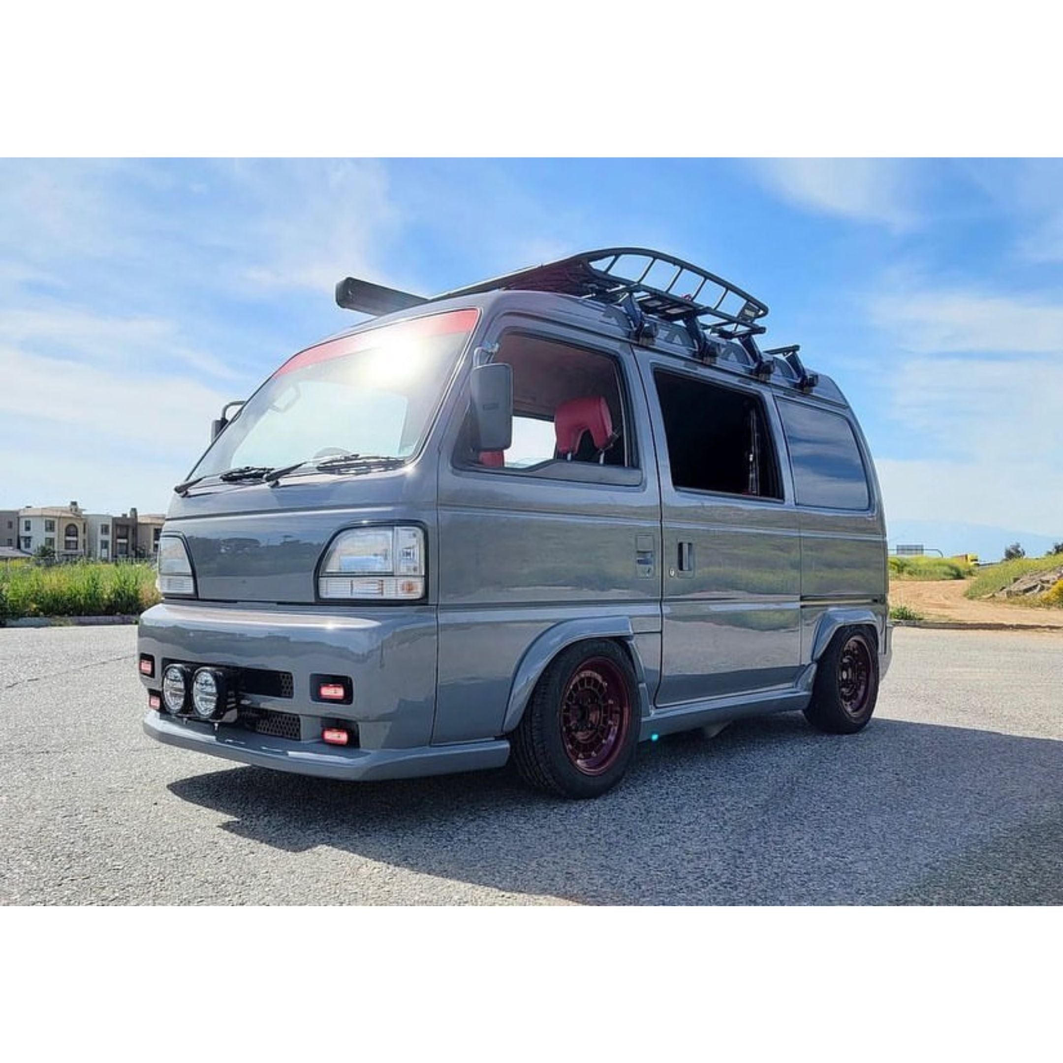Honda Acty Van HH3/HH4 (1992–1999) with Mag Factory body‑color fender flares mounted on lowered red‑rim wheels, showcasing the aggressive widened stance and seamless OEM‑style integration.