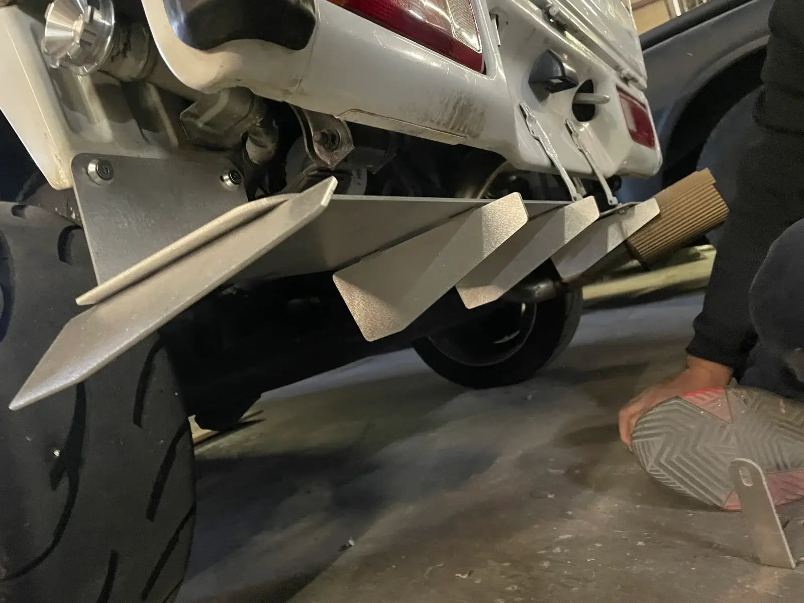 Rear diffuser for Honda Acty Truck HA3, HA4 models, silver metal, angled design, installed under the rear bumper