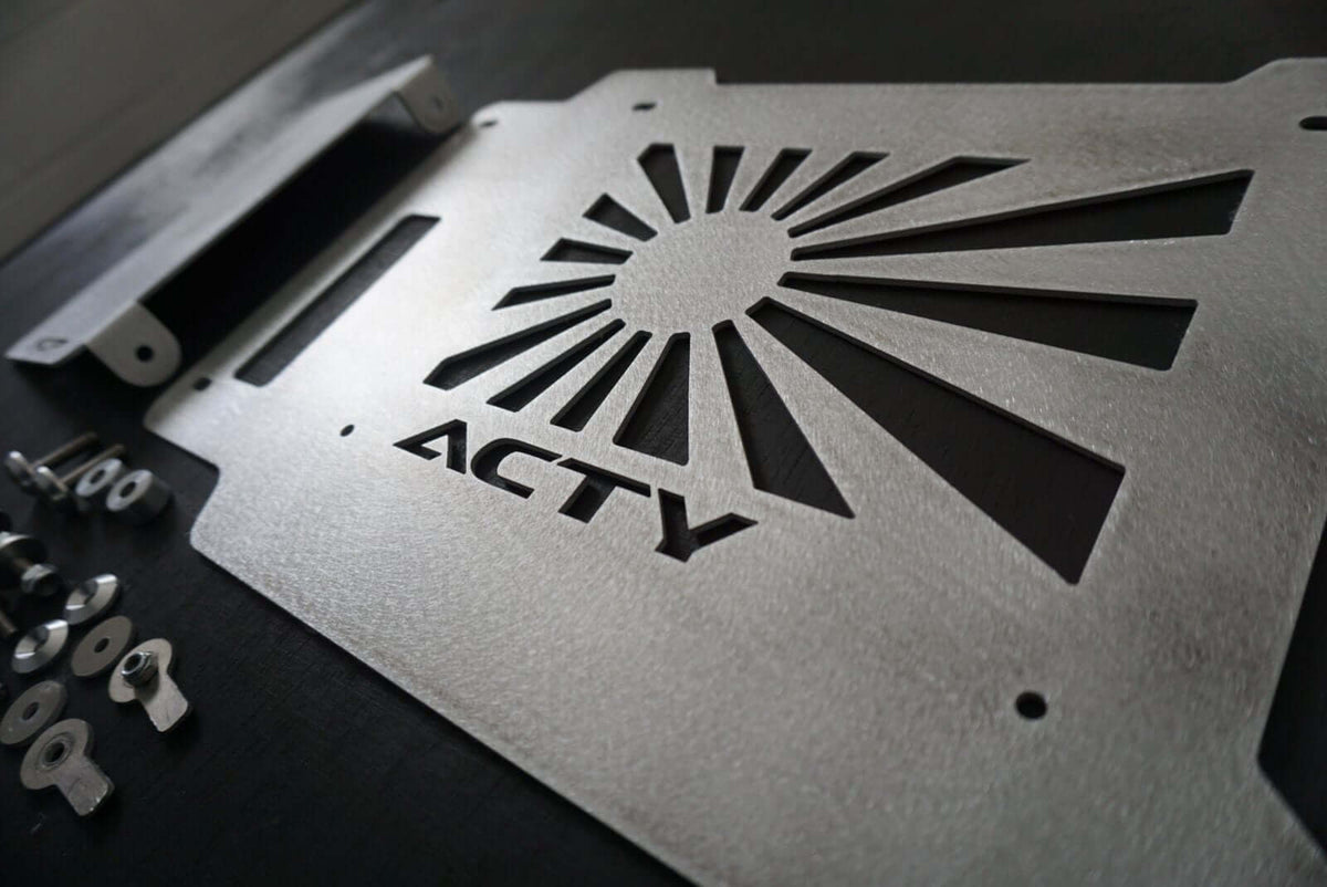 Rising Sun Battery Cover for Honda Acty Truck, silver metal with cut-out design, showcasing 'ACTY' logo and sun rays