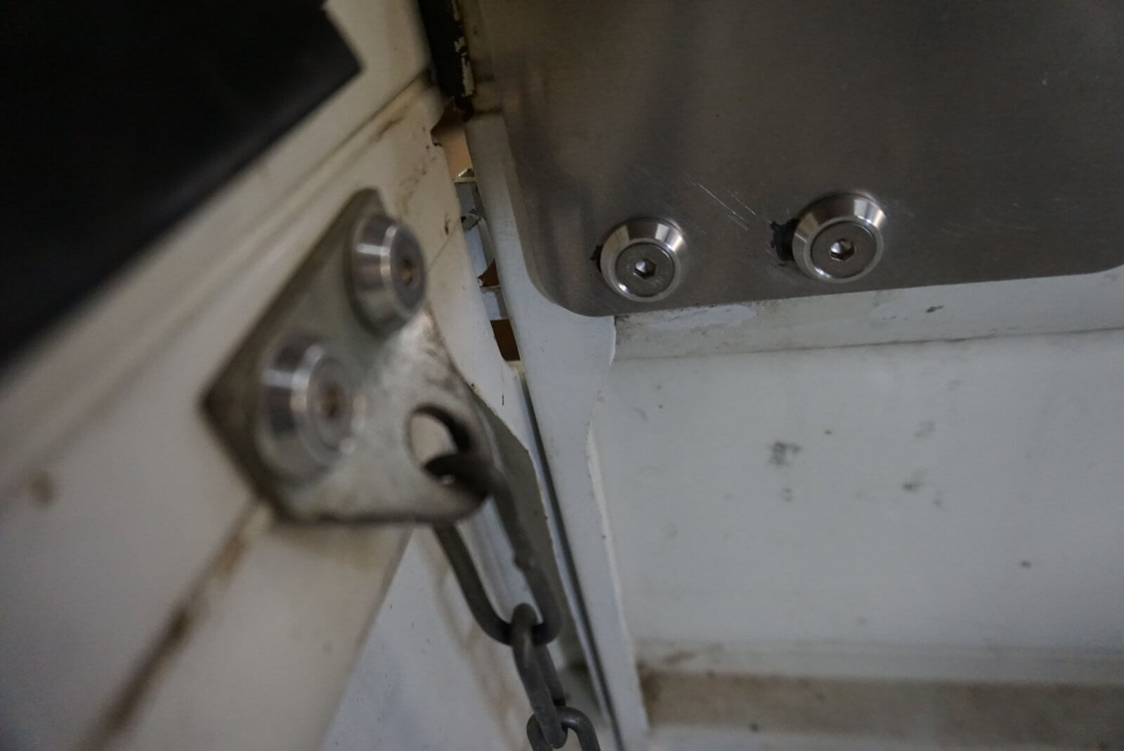 Stainless Bed Bolt Kit Upgrade for Honda Acty Truck, featuring shiny bolts and a clean metal finish, installed on a truck bed