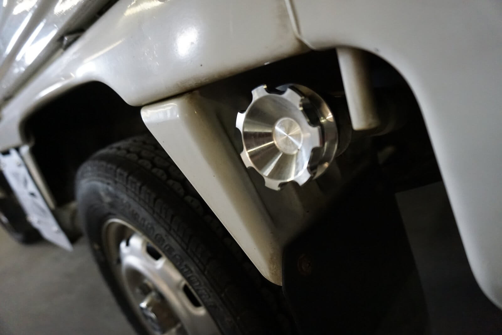 Precision CNC-machined stainless oil cap for Honda Acty Truck models HA1-HA4 from 1980-1999 featuring keyless snap-on installation.