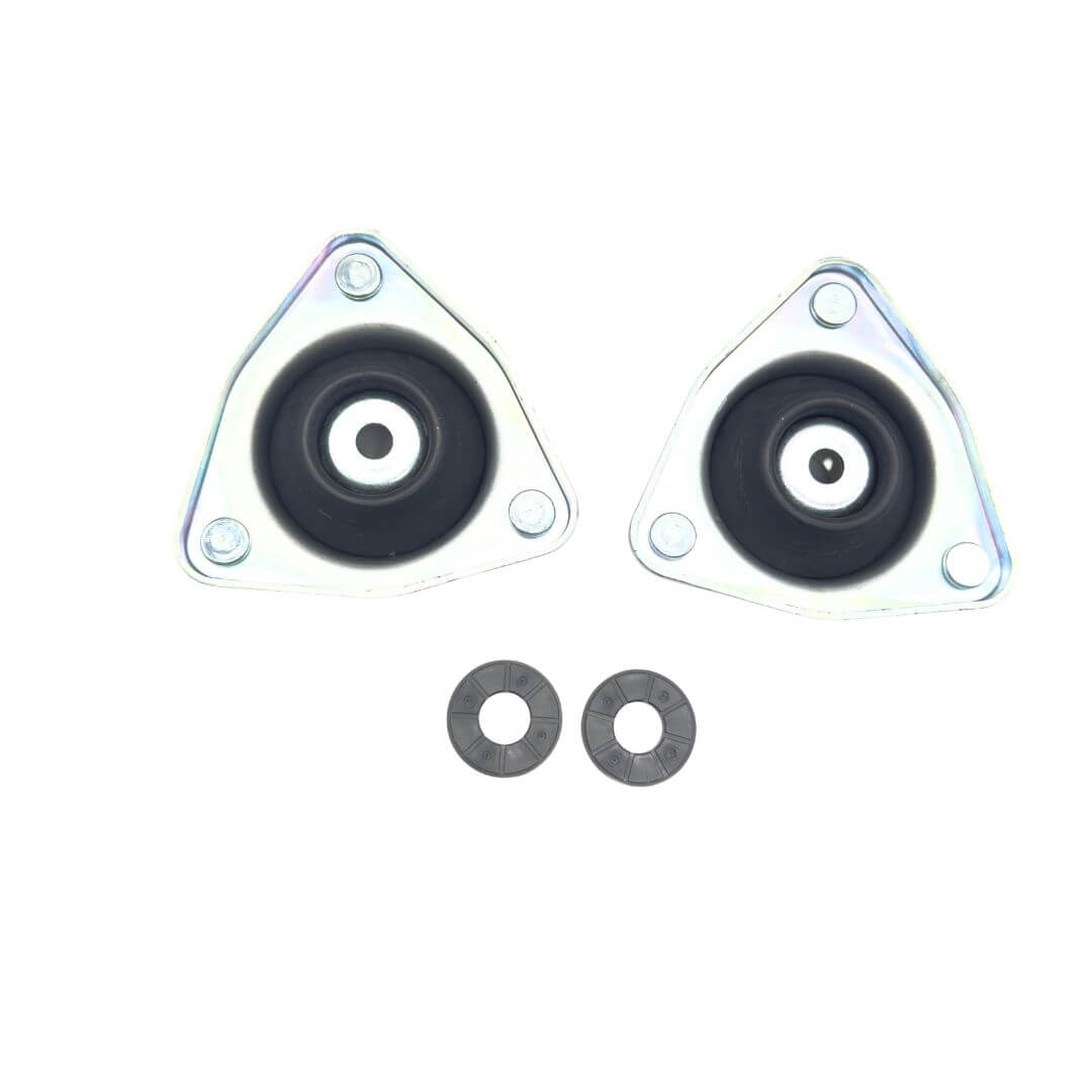 Angle view of the Honda Acty Van HH5, HH6 front suspension strut mounts 51920-S3A-014 (GMHO-10010), showing the mount bodies and bearing seats.