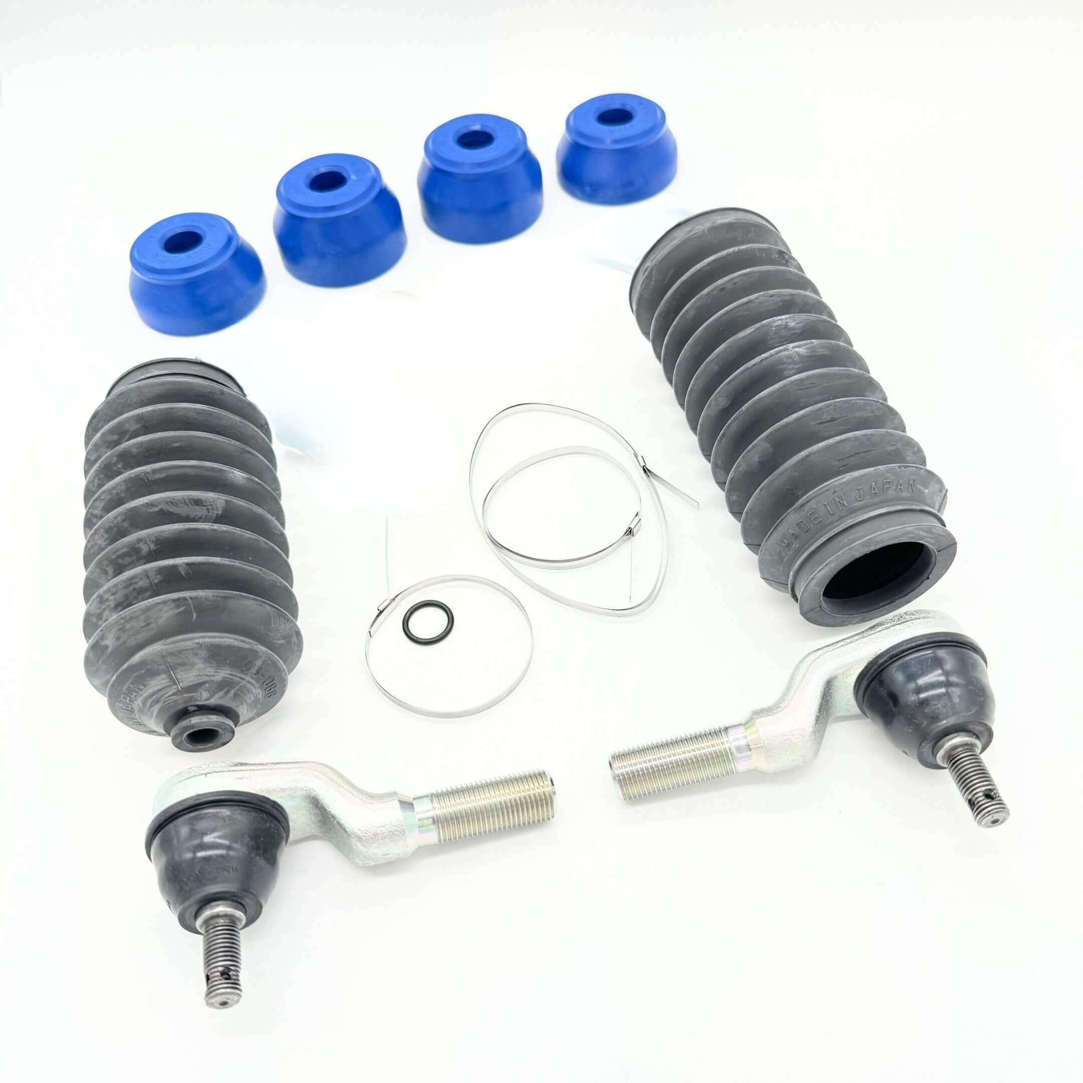 Steering & suspension upgrade kit for Honda Acty HH3 HH4 1990-1999 with inner tie rod ends, steering rack boots, blue polyurethane bushings, clamps, and O-ring on white background
