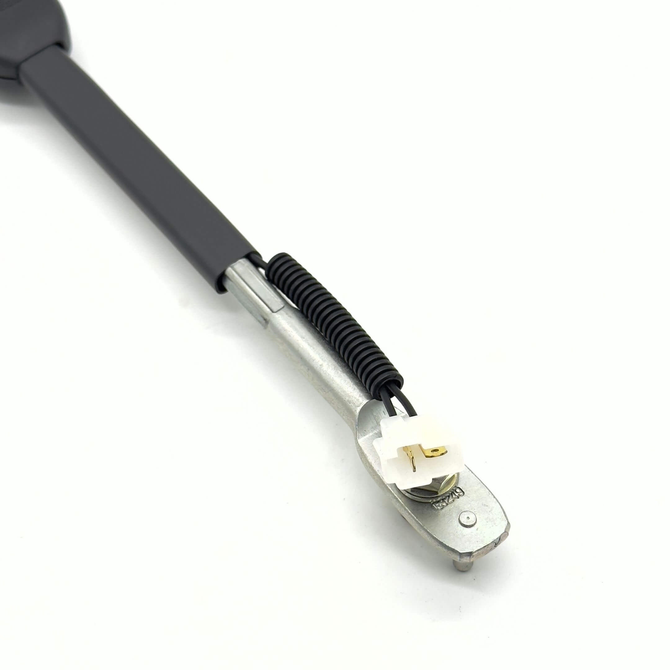 Seat Belt Buckle for Driver Side Subaru Sambar Truck TT1, TT2 Models (1999-2012) featuring a durable metal and plastic construction with a coiled wire attachment.