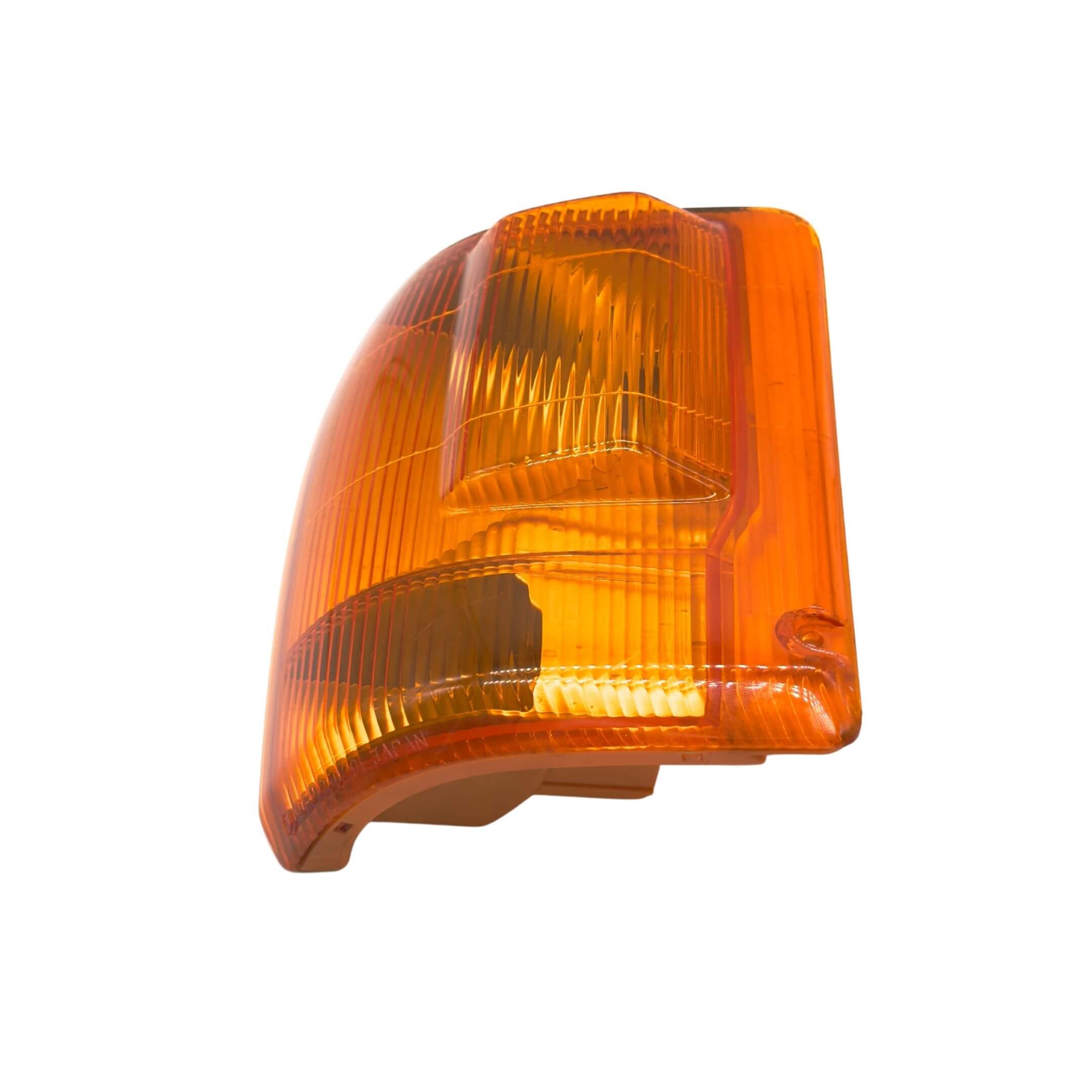 Front Turn Signal Lamp Assembly for Subaru Sambar Truck TT1, TT2 Models (1999-2012) featuring an amber lens and durable construction.