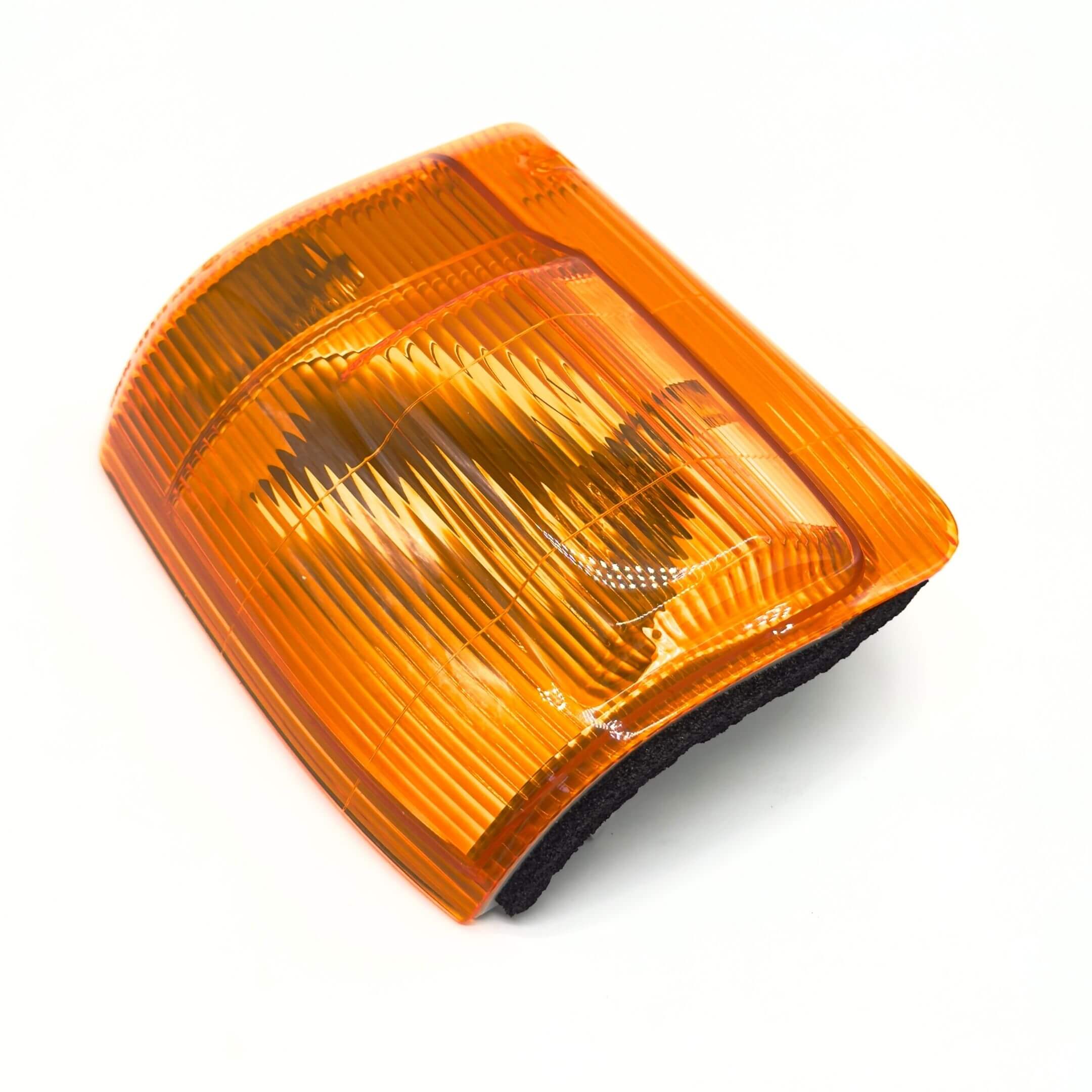 Front Turn Lamp Assembly - Right / Driver Side for Subaru Sambar Van TV1, TV2 Models (1999-2012) featuring a vibrant amber lens with textured detailing.