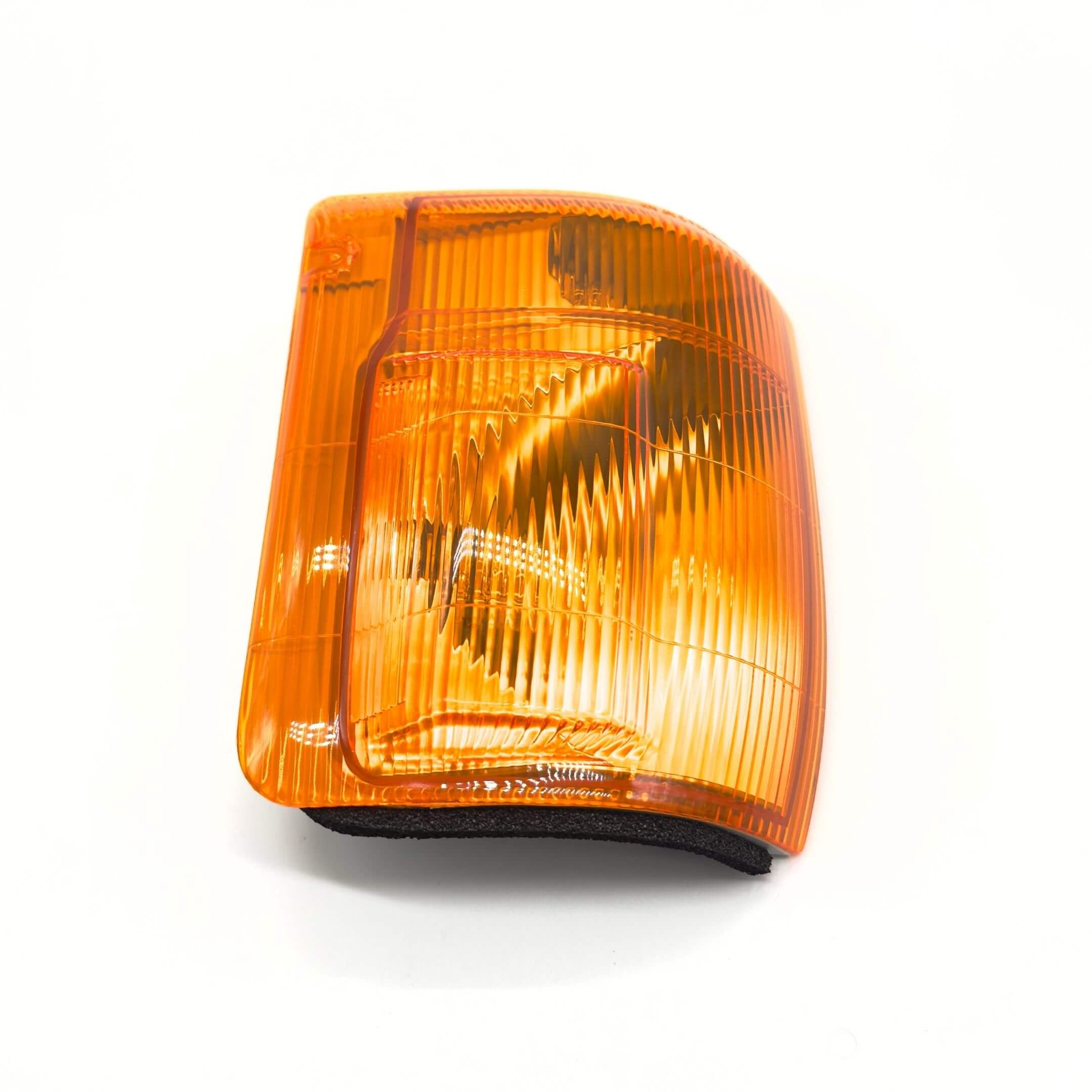 Front Turn Lamp Assembly - Right / Driver Side for Subaru Sambar Wagon TW1, TW2 Models (1999-2012) featuring an amber lens with a textured surface.