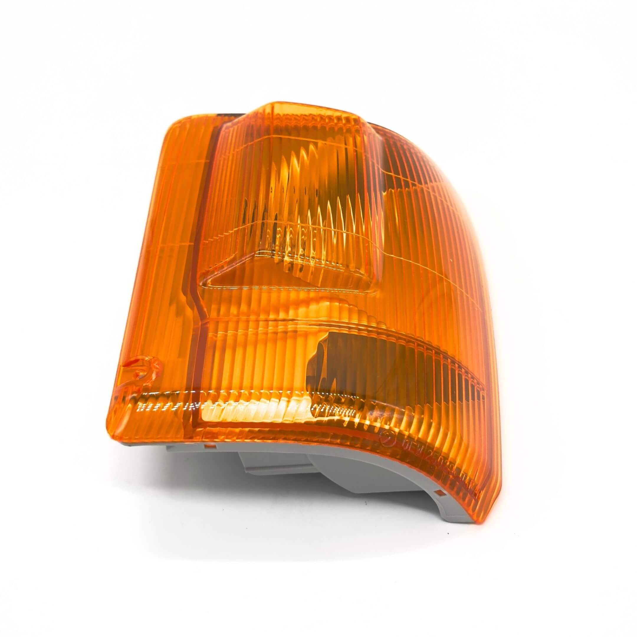 Front Turn Lamp Assembly - Right / Driver Side for Subaru Sambar Wagon TW1, TW2 Models (1999-2012) featuring an amber lens with a ribbed design.