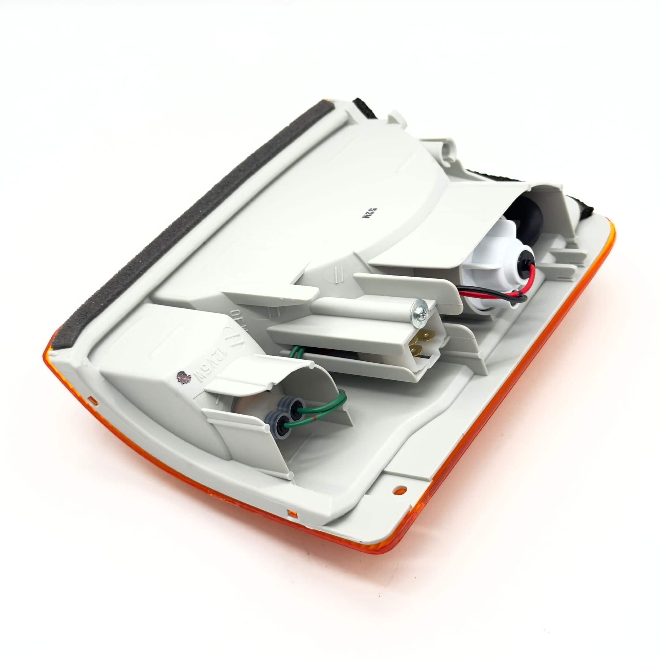 Front Turn Lamp Assembly - Right / Driver Side for Subaru Sambar Truck TT1, TT2 (1999-2012) featuring a durable white housing and wiring connectors.