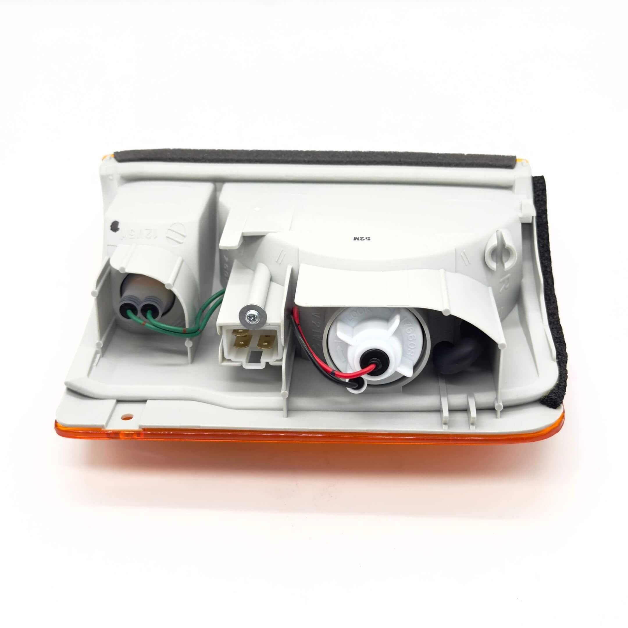 Front Turn Lamp Assembly for Subaru Sambar Truck TT1, TT2 Models (1999-2012) featuring wiring connectors and orange lens.