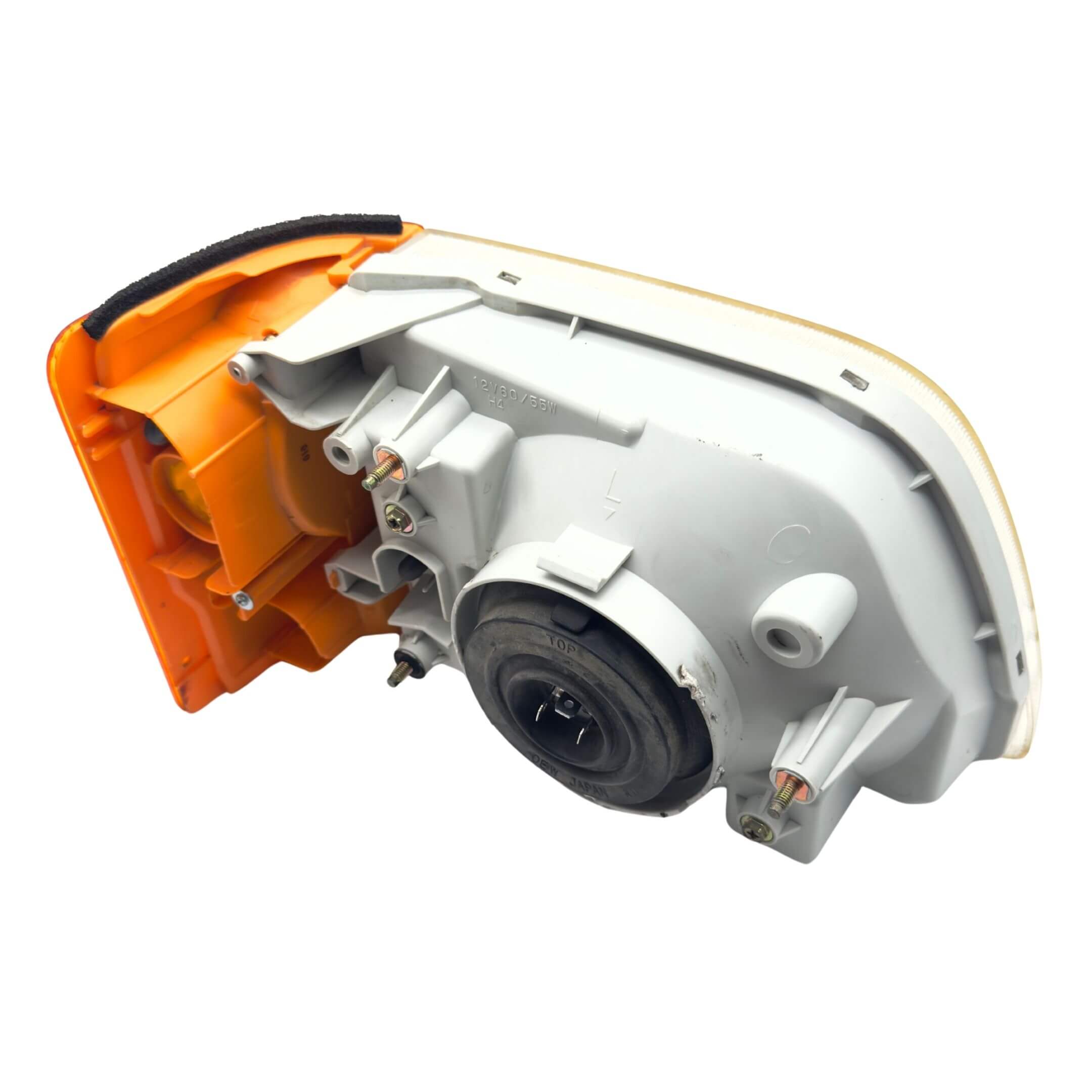 Headlight and Turn Signal Assembly for Subaru Sambar Van TV1, TV2 Models (1999-2012) featuring a durable white and orange casing.