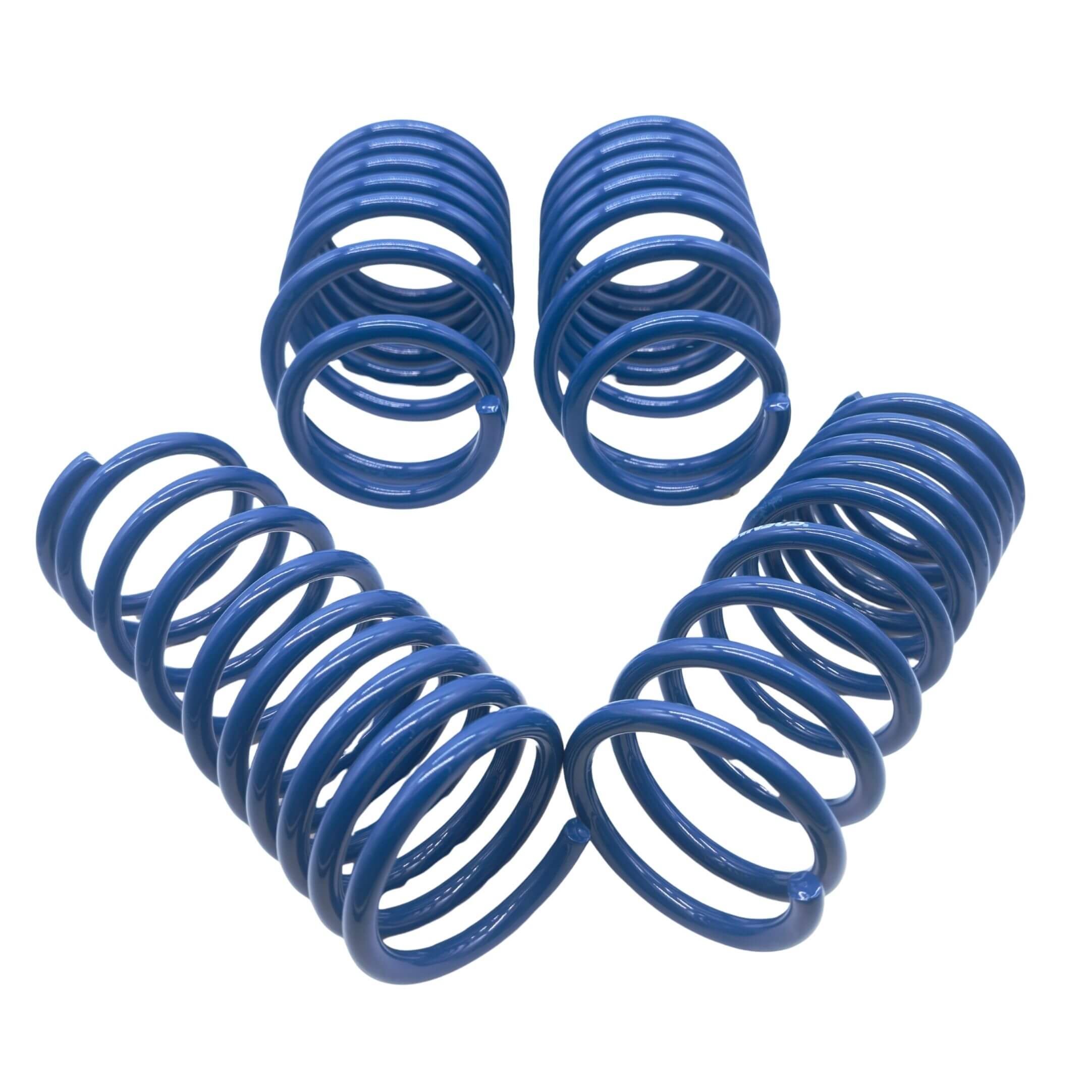 Espelir Super Down Springs for Subaru Sambar Van TV1, TV2 models (1999-2005), featuring a vibrant blue finish and lowering capability of 1.38–1.57 inches front and 1.46–1.65 inches rear.