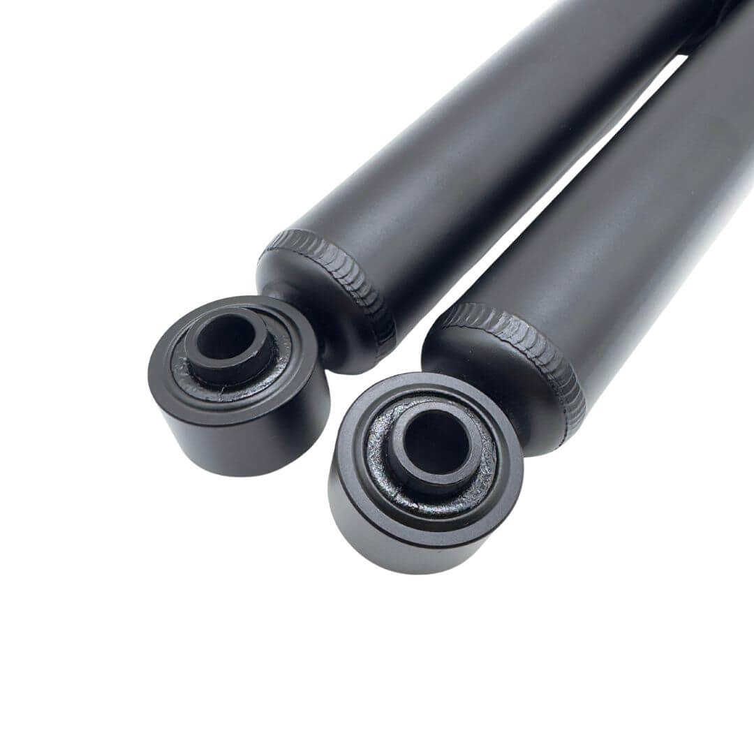 Close-up of bushings and mounting eyelets on Subaru Sambar TT1 TT2 rear shocks KSA1135, OEM 20365TC000