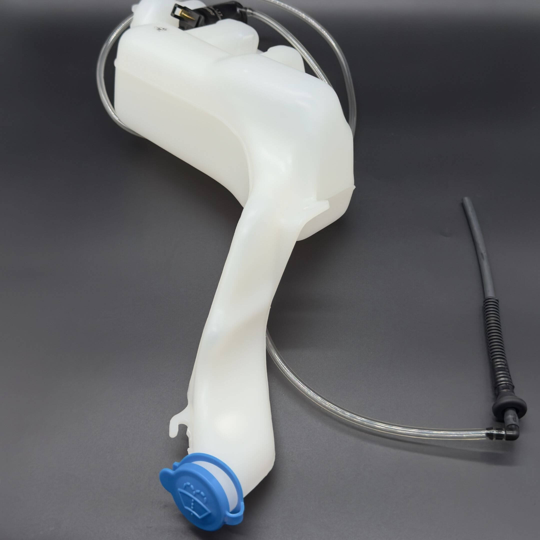 Windshield Reservoir Tank Assembly with Pump for Subaru Sambar Truck TT1, TT2 Models (1999-2012) featuring a white plastic body and blue cap.