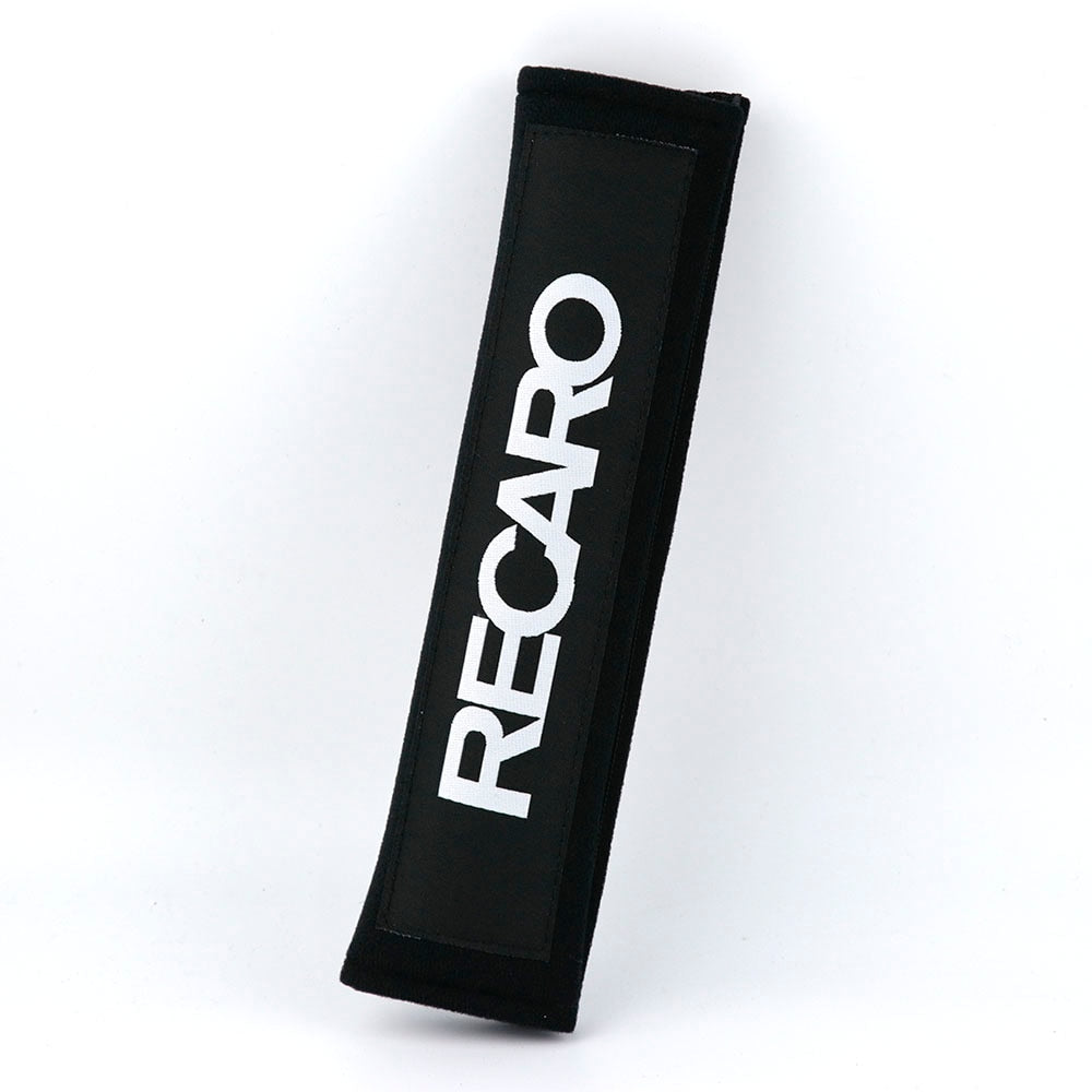 Black Recaro seatbelt cover featuring a white logo, designed for comfort and style in kei trucks