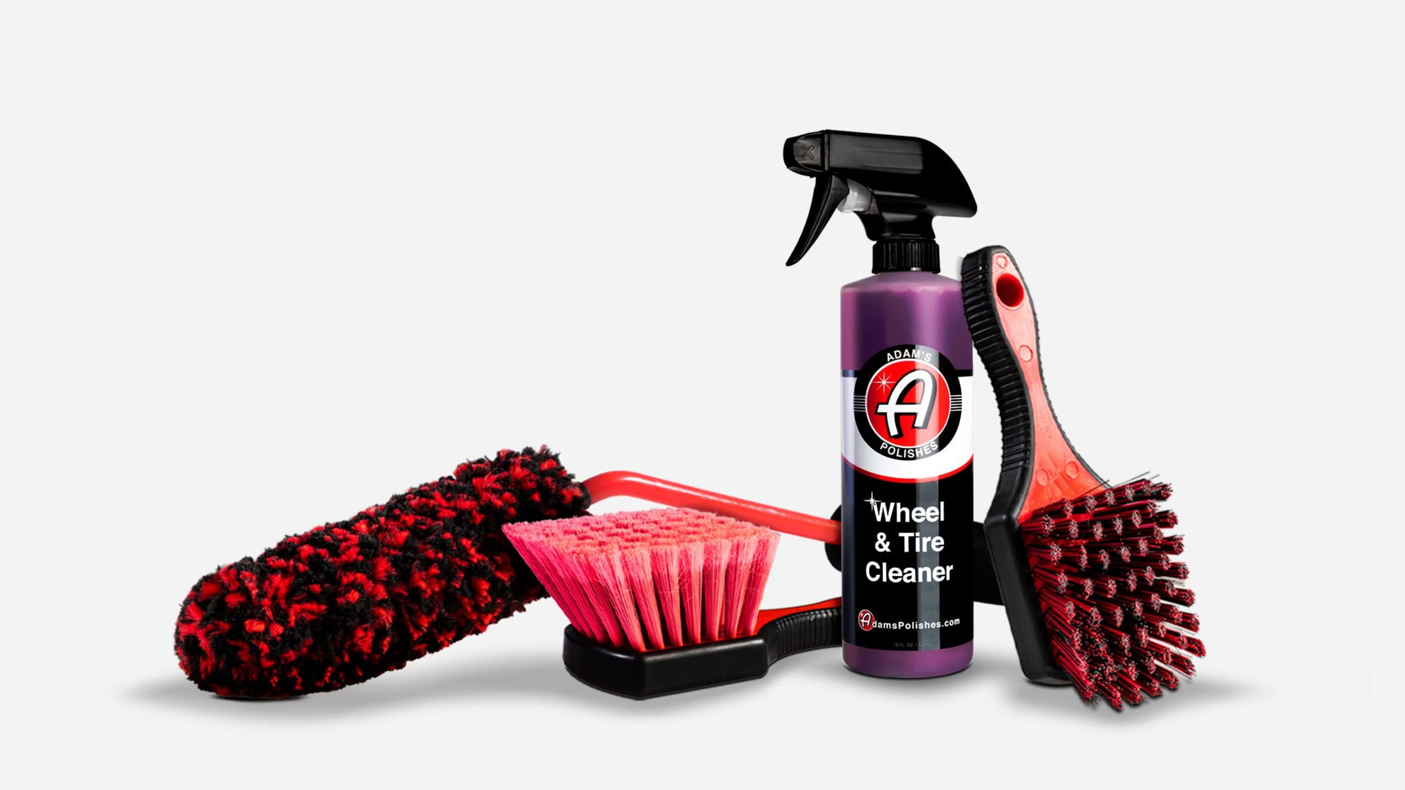 Car cleaning tools including a wheel and tire cleaner spray, brush, and mitt for best car wash soap.