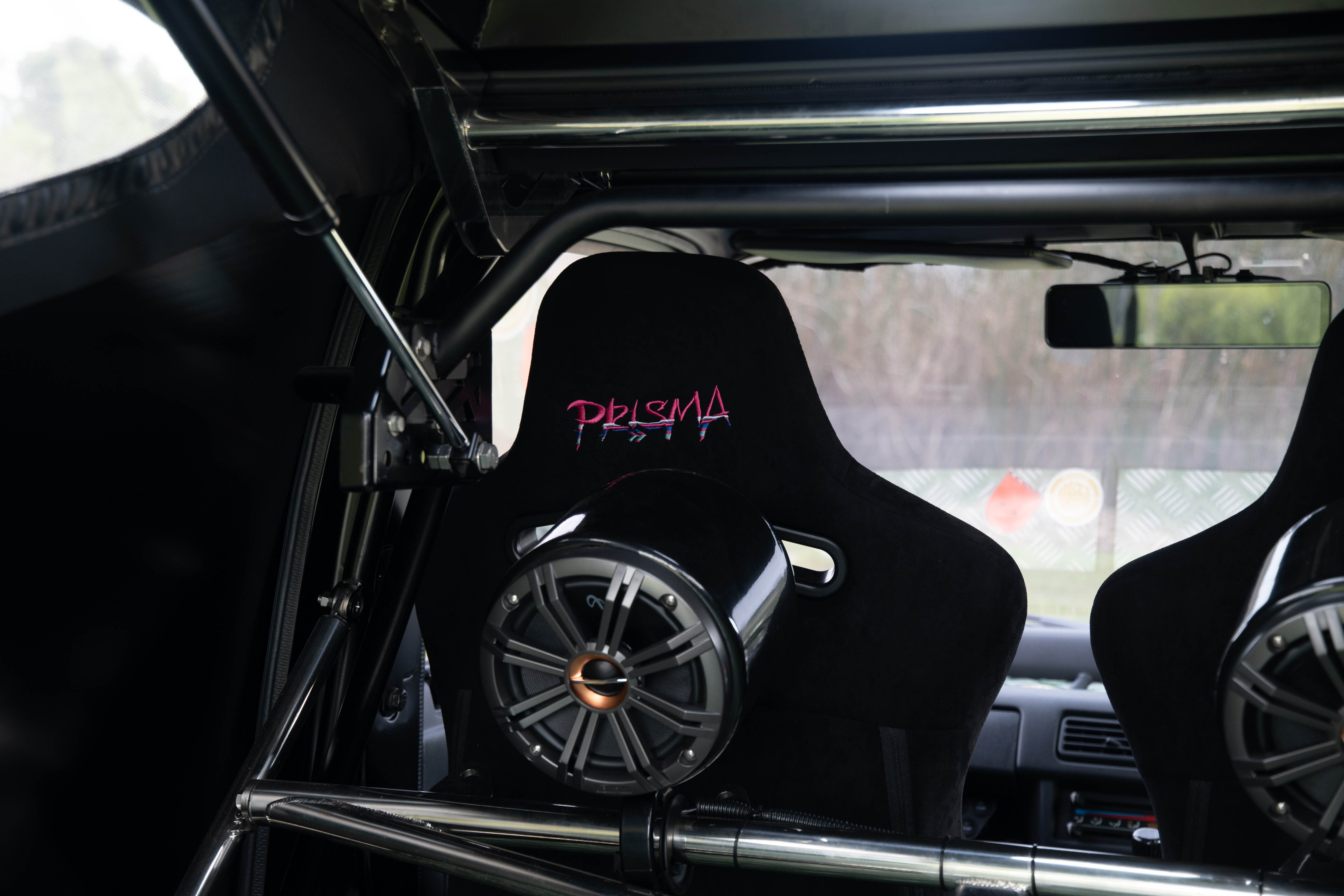 Close up of Prisma aftermarket seat covers on a custom Honda Acty