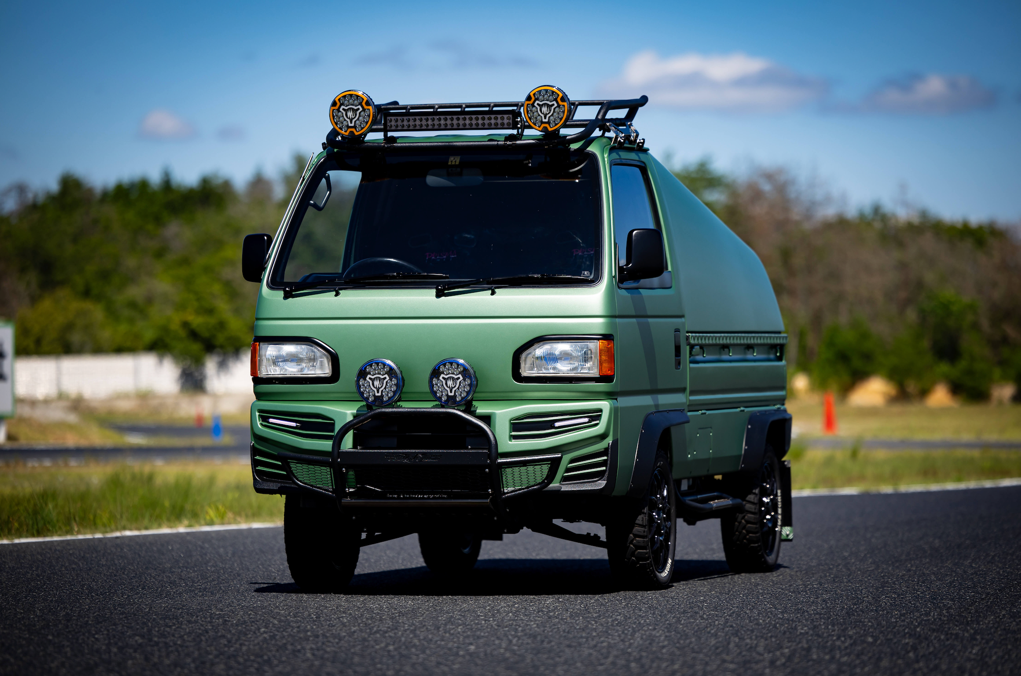 Custom Green Honda Acty Kei Truck Camper by Oiwa Garage and Grasshopper - Showcasing at SEMA 2024 with Luxury Features for Modern Adventurers.