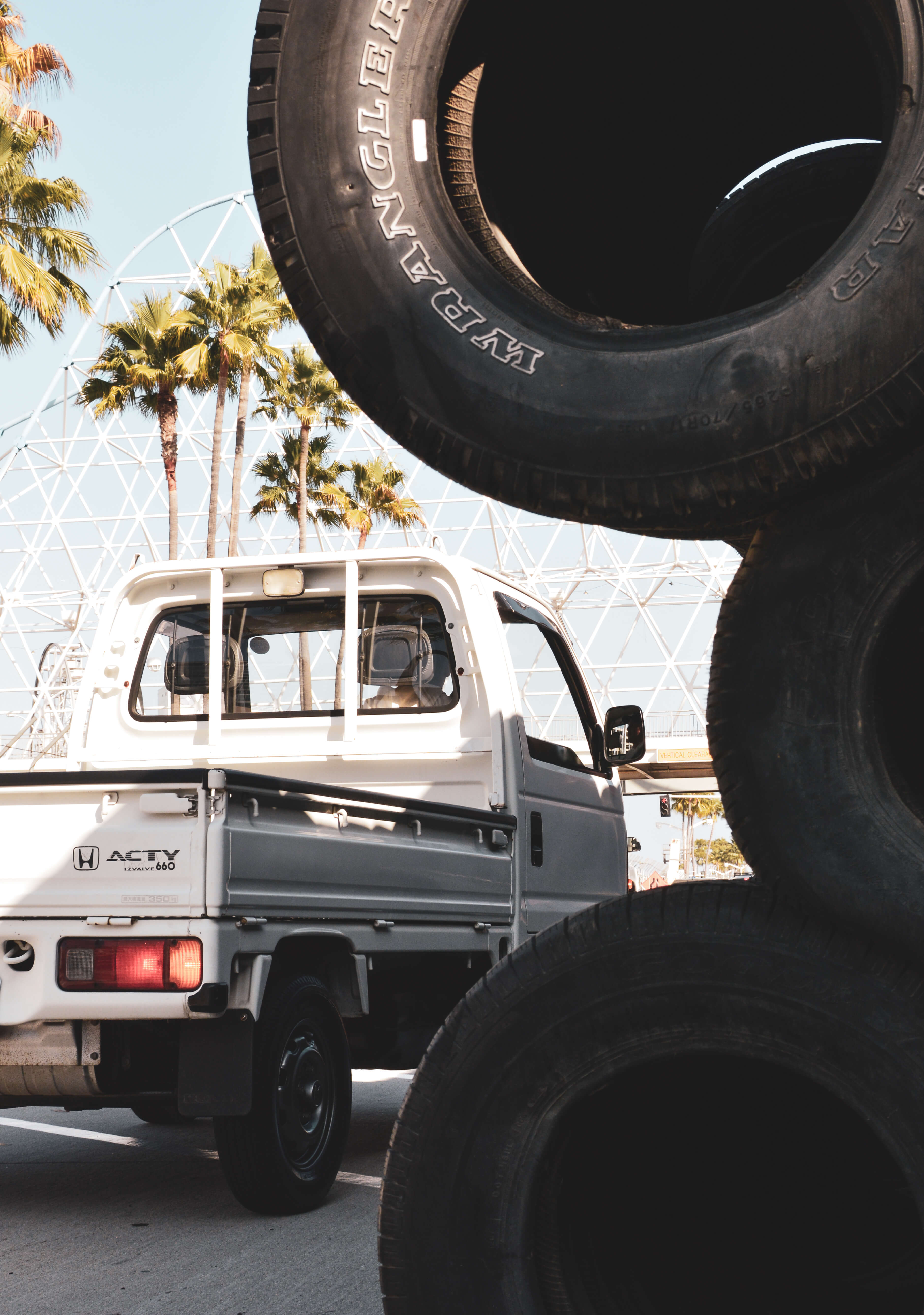 A kei truck parked in California, showcasing its compact size and unique appeal in the midst of bureaucratic challenges.